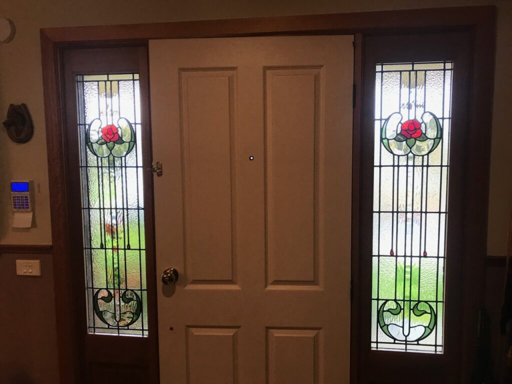 Traditional entrance leadlights.